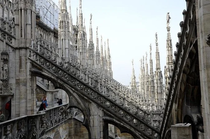 Flying buttresses and spires along the side of the Duomo roof